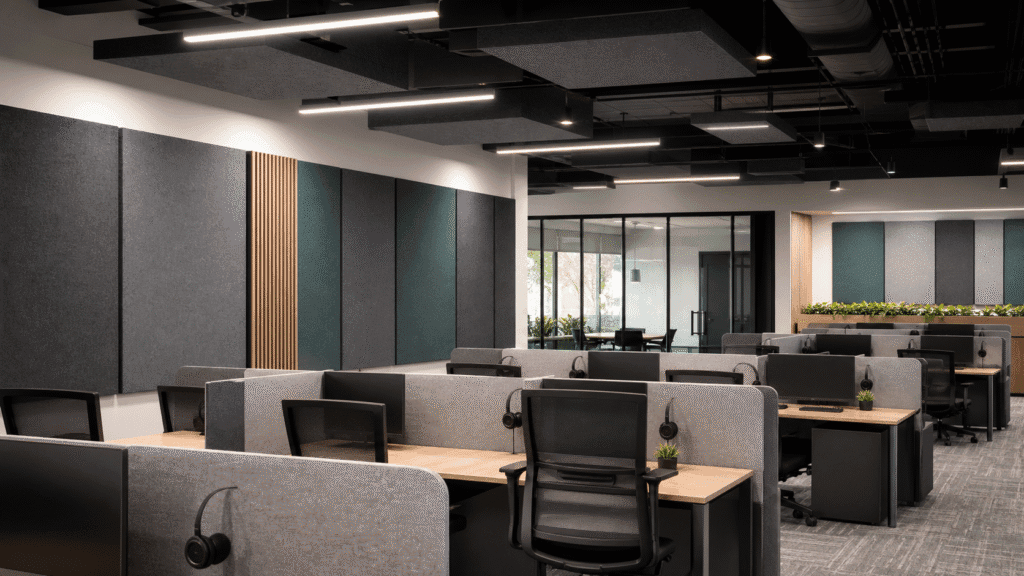 Acoustic panels installed in an open-plan call center with wall panels and ceiling baffles
