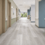 SPC Flooring for Healthcare and Education Corridors: Slip Resistance, Subfloor Tolerance, and Maintenance Planning
