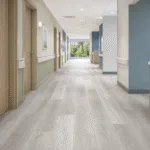 SPC Flooring for Healthcare and Education Corridors: Slip Resistance, Subfloor Tolerance, and Maintenance Planning