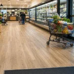 SPC Flooring for Supermarkets and Grocery Stores: Trolley Loads, Wet Entrances, and Batch Control